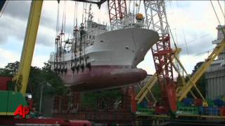 Tsunami-tossed Ships Rescued in Japan