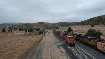 Tehachapi Loop, Cable to Caliente on the Mojave sub via the air in 4k - May 2025.  Grain, manifests