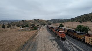Tehachapi Loop, Cable to Caliente on the Mojave sub via the air in 4k - May 2025.  Grain, manifests