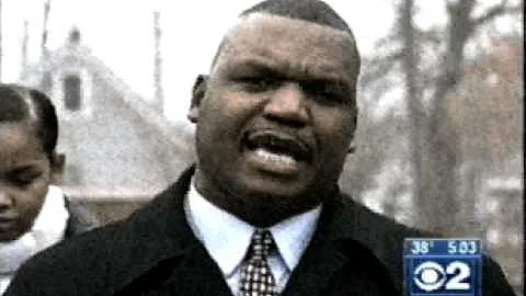 DERRICK MOSLEY STANDS WITH A FEMALE STUDENT BEATEN...