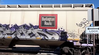 A Southbound BNSF #7602 Grain Train With & Burlington Route Grain Car