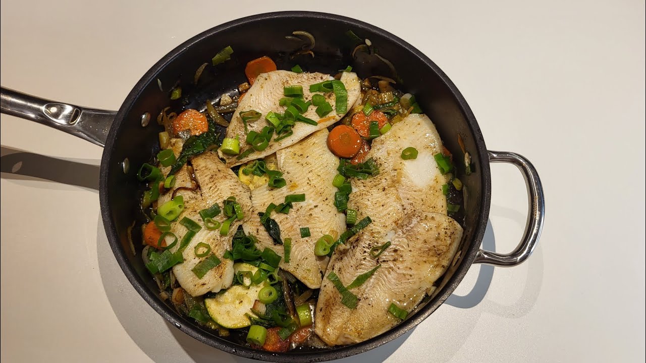 lemon sole filet fish with spinach, zucchini and very delicious and