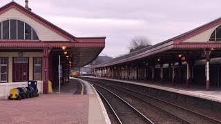 DRS Large logo 37403 and Intercity 37419 pass Aviemore with a Network Rail IM working to Inverness
