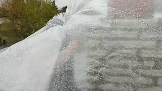 Tuck pointing in the rain