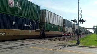 UP 8198 leads slow westbound stacktrain with DPU helper