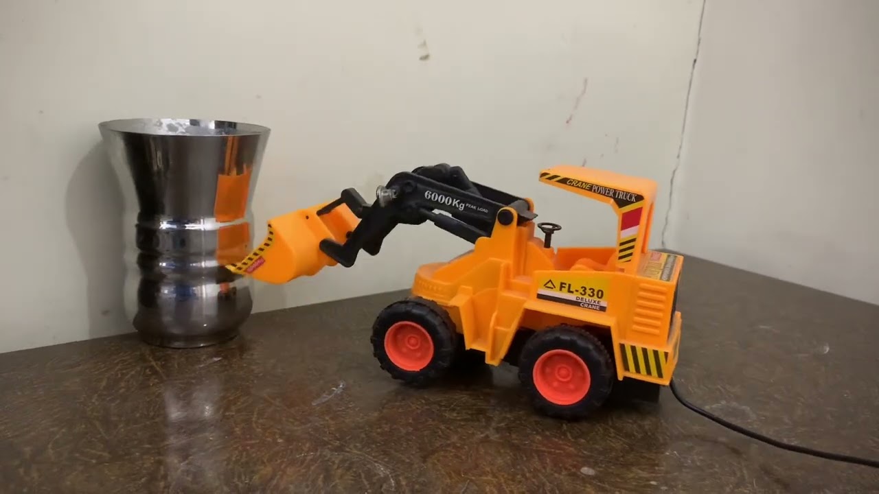 Ultimate Remote Control Rc Crane is Trying to Lift Silver Glass with its mechanical Claws Heavy!