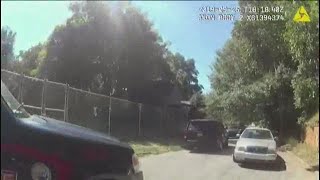 Bodycam video shows Atlanta police officer pull gun on civil rights activist