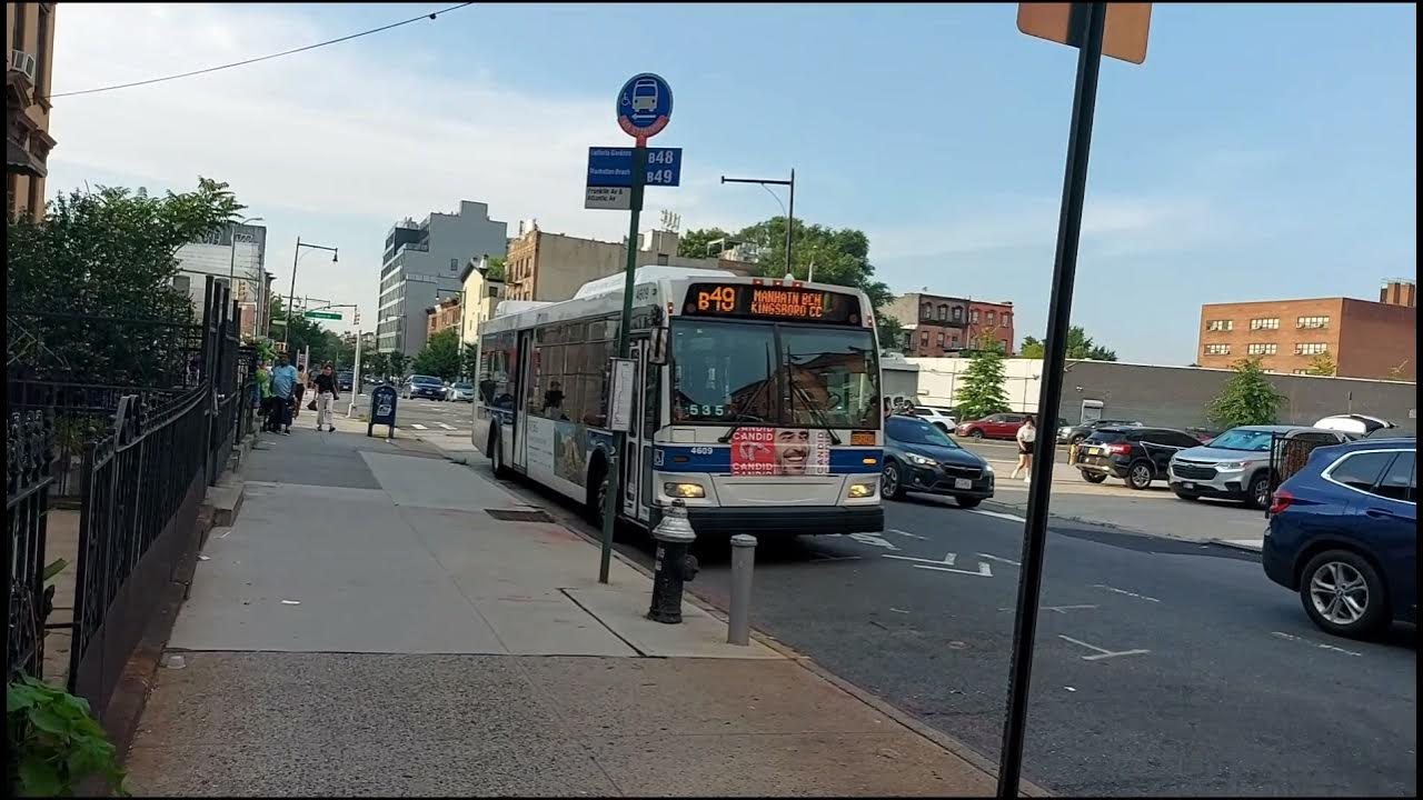 Monsey Trails & MTA MCI (unknown model) 9932 leaves the depot and