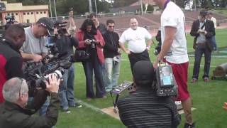 Joe Nedney celebrates his win against Ziggy the robot