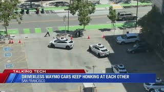 Driverless Waymo cars keep honking at each other