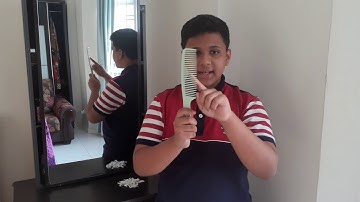 Static Electricity: Experiment Picking up small paper pieces with a comb