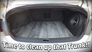 Installing grey wood laminate in the trunk of an Infiniti Q50
