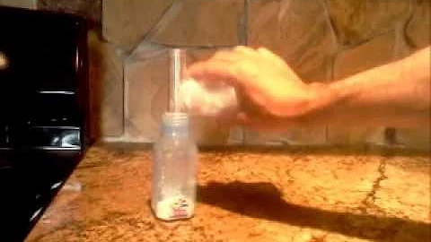 Infant Formula measuring and dispensing cap demons...