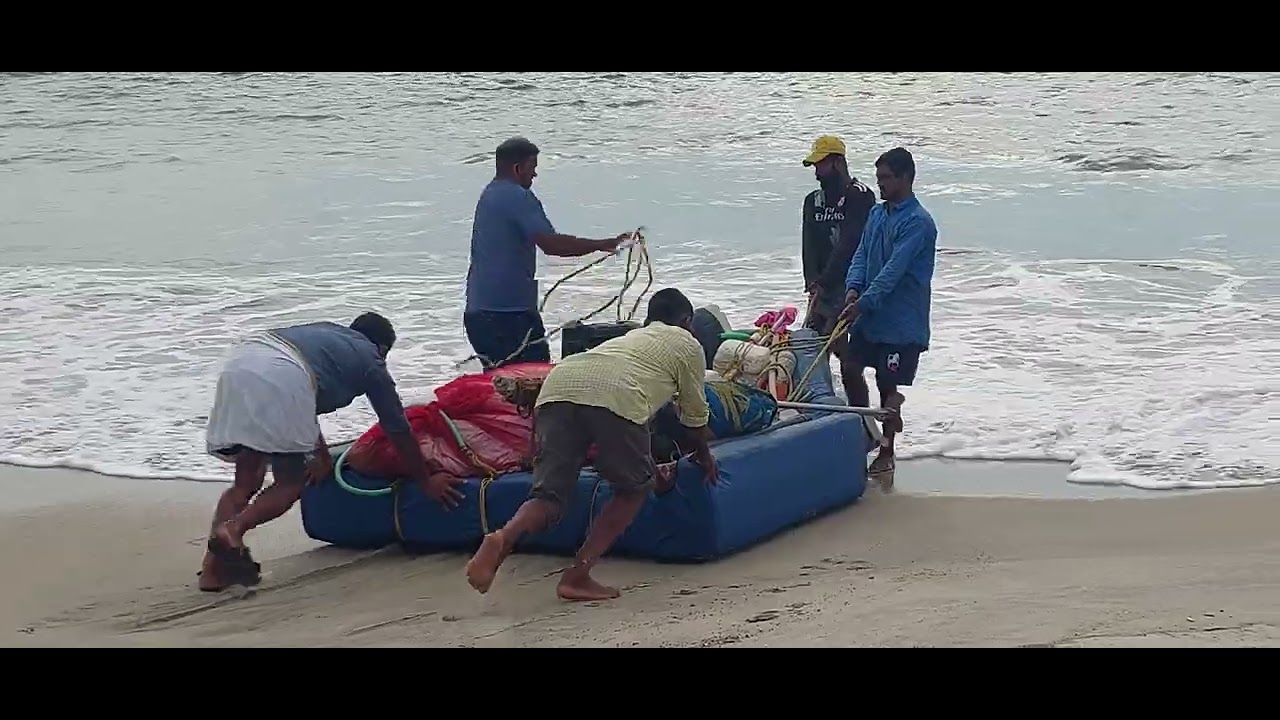 Thermocol Boat fishing in Arabian sea at Andhakaaranazhi, Kerala near Alleppy.