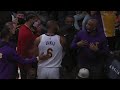 LeBron and Phil Handy screaming at each other while going to the locker room