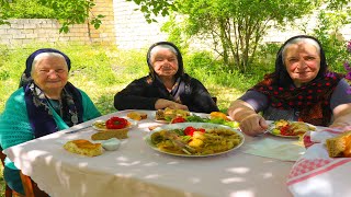 Grandmother cooks cabbage dolma with her sisters