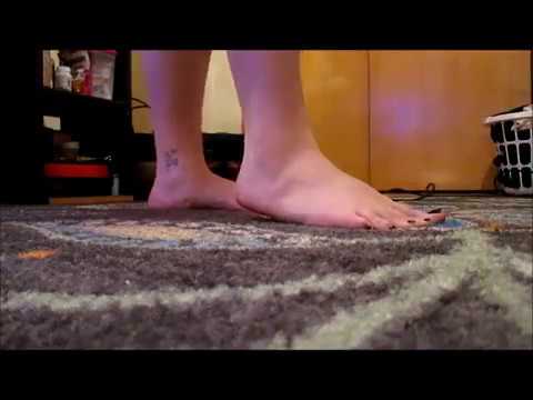 Cute girl feet vacuuming