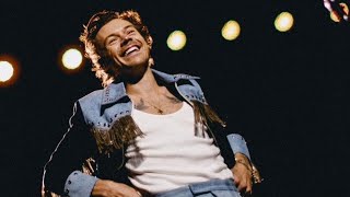 Harry Styles Laughing on stage during Love on tour 2022