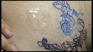 flower tattoo on side boob | art done by Rnl Artv