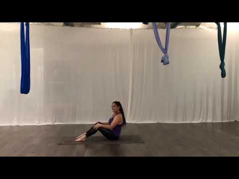Half Roll back with a Twist - Pilates Mat Exercise