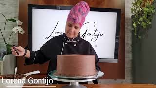 Coating a 25x10 cake with ganache and whipped cream for good structure.