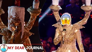 The Masked Singer - Candelabra (Performances and Reveal)
Solo performances of Candelabra performing on Season 10 of the Masked Singer.
Candelabra is entirely golden, with the middle holder being her face, and the candlewax on top designed as her hair. She has two more candle holders alongside her shoulders, has golden design patterns throughout her body, and the base doubling as skirt.
Clue Answers:
The phone call to Kevin Hart referenced to her 2010 album, Calling All Hearts.
The Christmas present that said Santas Naughty List was a clue to her last name, Cole, because you get coal if youre naughty.
Robopine (Tyrese Gibson) was clue to his appearance in Keyshias music video Love.
The royal flush was a clue to her song Playa Cardz Right.
The package that said From The Angels was a clue to her song Heaven Sent.
The shoes were a clue to Keyshias Steve Madden shoe collection.
The reality television was a clue to her appearing in many reality TV shows. The Masked Singer - Candelabra (Performances and Reveal)