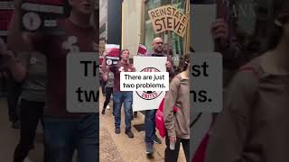 Trader Joe’s workers protest outside the corporate offices over the firing of their colleague