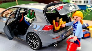 Volkswagen Golf VIII Norev 1:18 Diecast Model Car loading with Goods