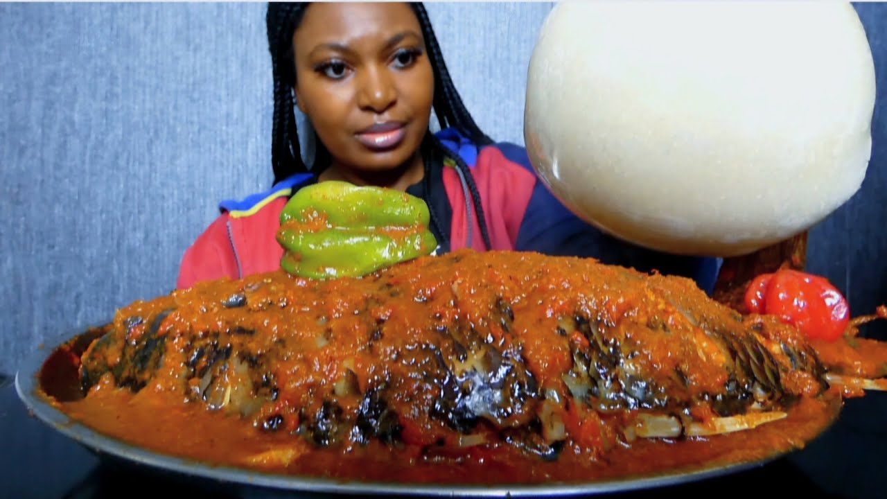 Cook and Eat With Me massive tilapia fish pepper soup with cassava fufu.