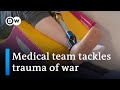 Wounded Ukraine girl relearns to walk one step at a time | DW News