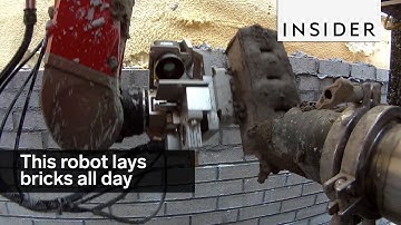 This robot lays bricks all day