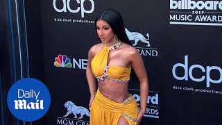 Cardi B \& Offset kiss for the 2019 Billboard Music Awards
