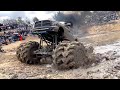 Mega trucks attempt impossible mud pit