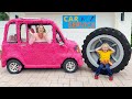 Chris helps mom take care of pink car