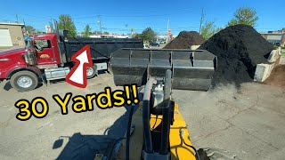 Caterpillar 930H Wheel Loader loading 30 Yards of Mulch on Tri-Axle Truck!