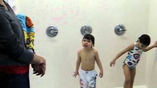 evan and his first co-ed shower  Feb 2011