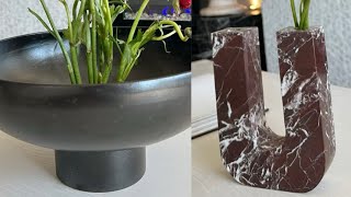 CB2 Pedestal bowl and Marble candle stick styling with flowers for minimalist Spring Look 2023