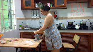 Ravioli Time! A housekeeper works in the kitchen. housekeeper works in the kitchen without panties.