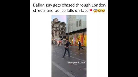 Balloon Guy chased through London streets and police officer face plants