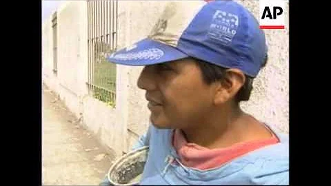 PERU: STREET CHILDREN HELP FIX POTHOLES IN ROADS