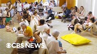 Parisians flee furnace-like heat wave by escaping to cooling centers