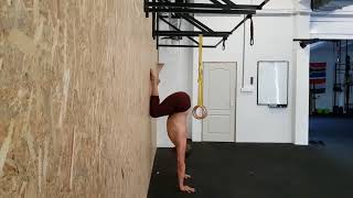 Explore The Movement - Wall Handstand Tuck Slides