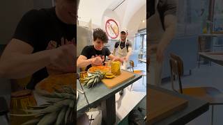 Cutting Pineapple On A Pizza In Italy