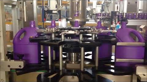 Electronic monohead capping machine with bottle orientation
