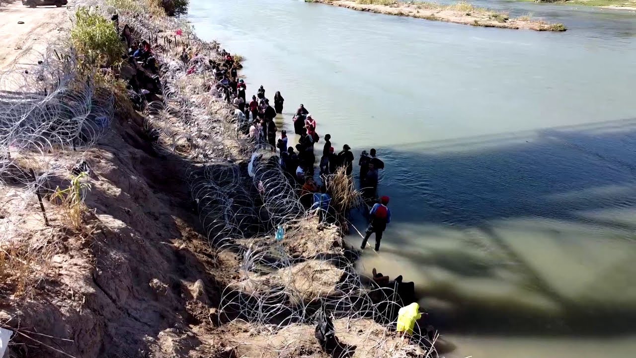 WATCH: Drone footage captures migrants along U.S.-Mexico border in ...