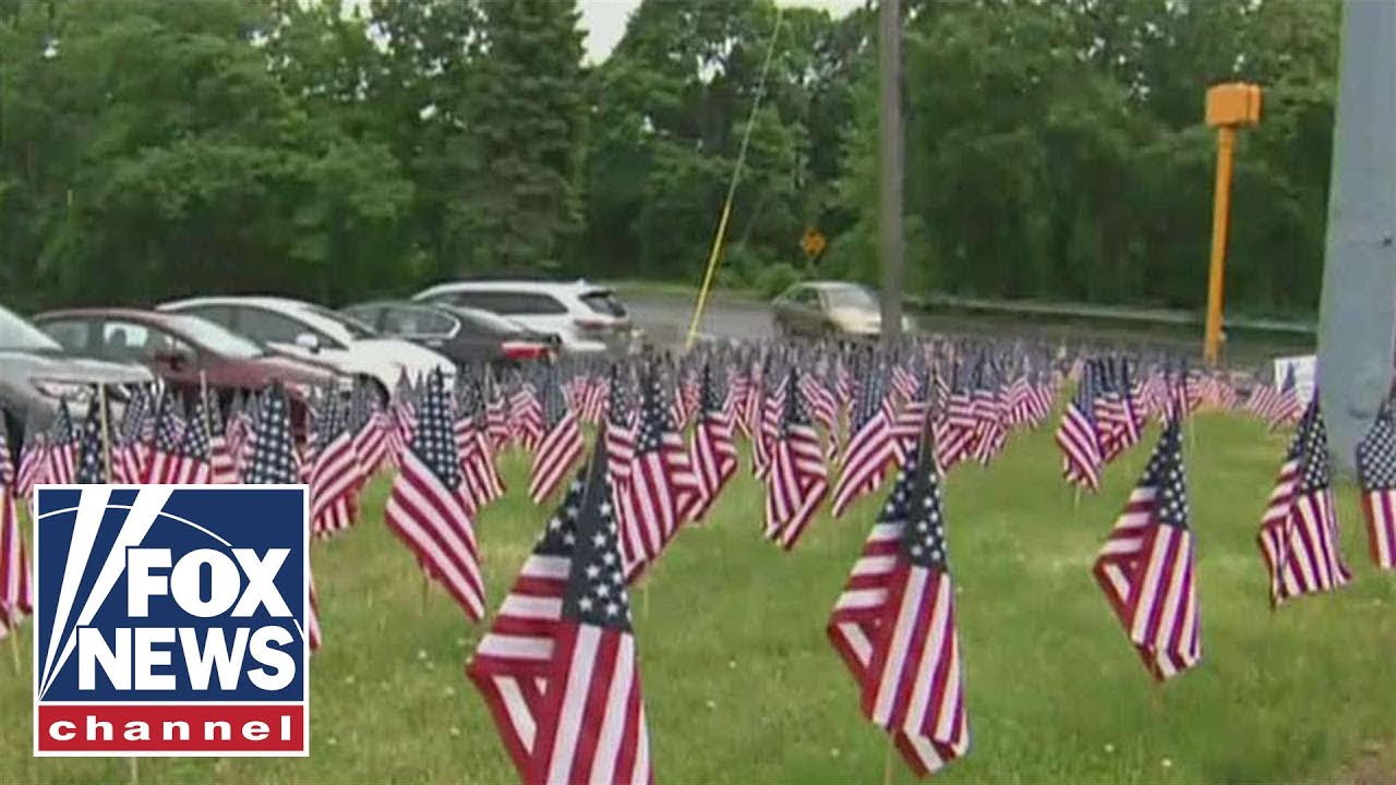 City tells business to remove 'excessive' American flags