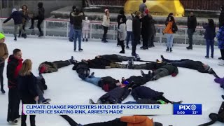 Climate change protesters hold die-in at Rockefeller Center ice skating rink, 9 arrested