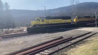 A day time NYSW SU-100 passing through Deposit NY