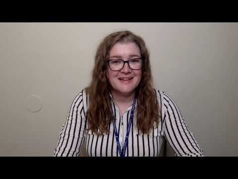 Video preview image of Principal Nolan sitting at a table talking.; click to visit the ParentSquare post with the video
