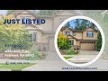 Just listed! Welcome to your stunning dream home in Wexford on Education Hill!